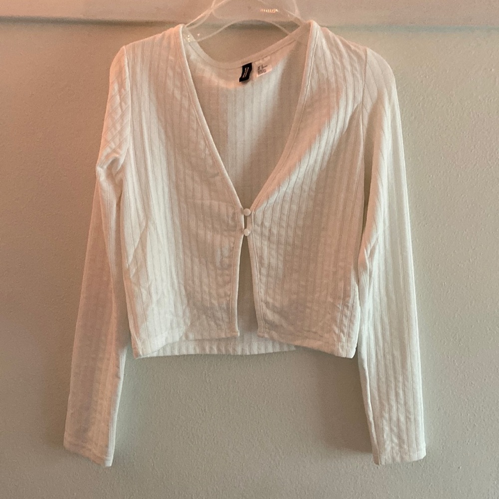 White cropped cardigan/top.